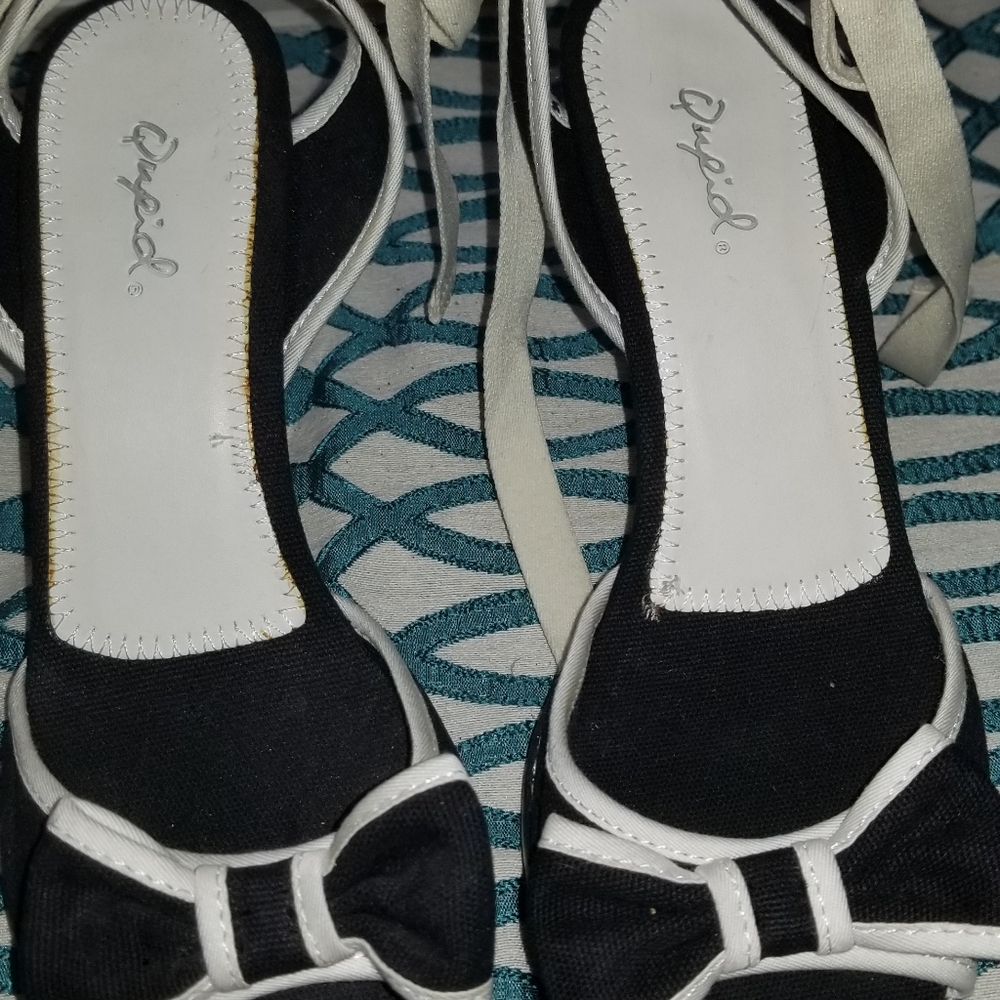 Cute black-and-white boat lace up heel sandals